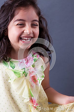 East Indian girl laughing Stock Photo