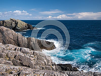 On the east of the island of Bruray on Out Skerries, Shetland, UK, light grey metalimestone of the Whiteness `division` Stock Photo