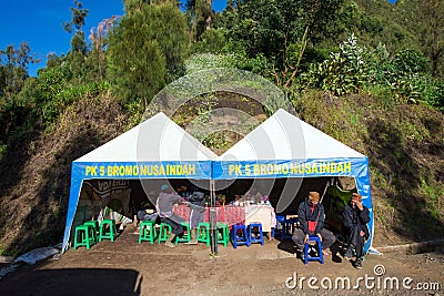 Tourists hiking to viewpoint on Mount Penanjakan,The best views from Mount Bromo to the Sand Sea below Editorial Stock Photo