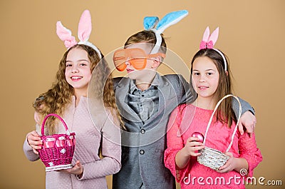 Easter activity and fun. Friends having fun together on Easter day. Children with little basket ready hunting for Easter Stock Photo