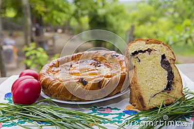 Traditional Romanian pasca, sweetbread, and Easter eggs Stock Photo