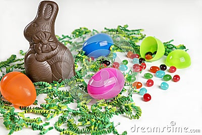 Easter background with chocolate bunny and jelly beans Stock Photo