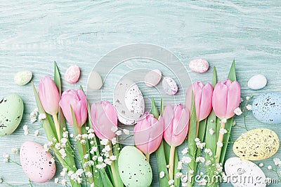 Easter background from eggs and spring flowers. Top view. Stock Photo