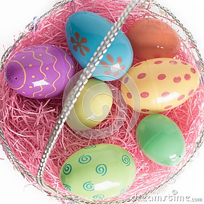 Easter Basket with Colorful Easter Eggs Stock Photo