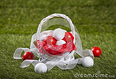 Easter Basket with Golf Balls and Ribbons Stock Photo