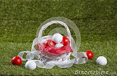 Easter Basket with Golf Balls and Ribbons Stock Photo