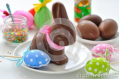 Easter Bunny and chocolate eggs Stock Photo