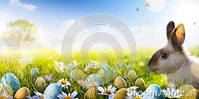 Art Easter bunny, Easter eggs and spring flower Stock Photo