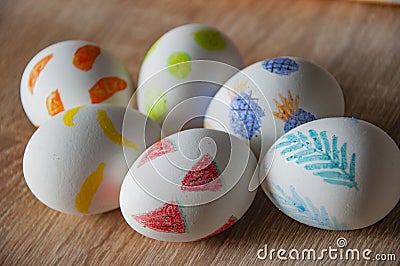 Easter bunny hunt. Spring holiday at Sunday. Eastertide and Eastertime. Good Friday. Hunting eggs. Painted eggs. Easter eggs on Stock Photo