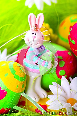 Easter bunny and painted eggs Stock Photo