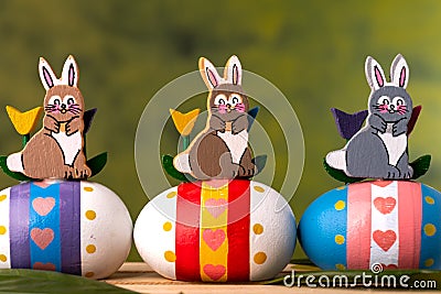 Easter bunnys and Easter eggs on green background spring meadow Stock Photo