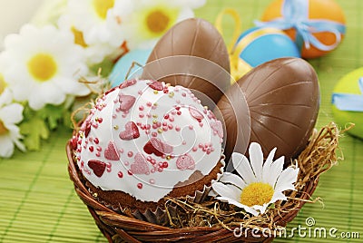 Easter cake and chocolate easter eggs Stock Photo