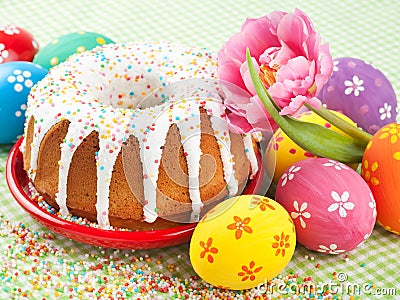 Easter cake, tulip and colorful eggs Stock Photo