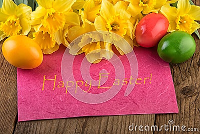 Easter card yellow flowers with text Happy Easter Stock Photo