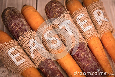 Easter carrots on a wooden background in rustic style Stock Photo