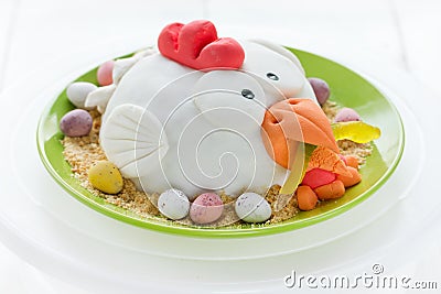 Easter chicken cake decorated fondant and chocolate candy eggs Stock Photo