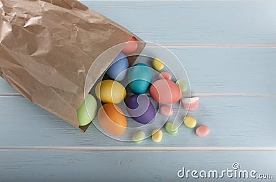 Easter colorful dyed chicken eggs in a paper bag Stock Photo