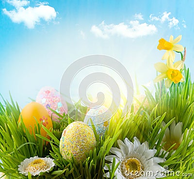 Easter. Colorful eggs in spring grass Stock Photo