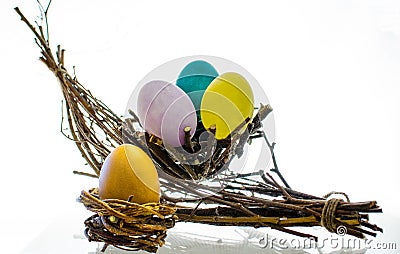 Easter composition with a colored egg in the nest Stock Photo