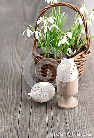 Easter composition with eggs and spring flowers Stock Photo