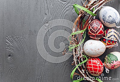 Easter concept . eggs and wreath on a wooden background Stock Photo