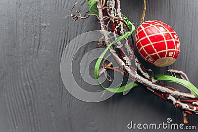 Easter concept . eggs and wreath on a wooden background Stock Photo