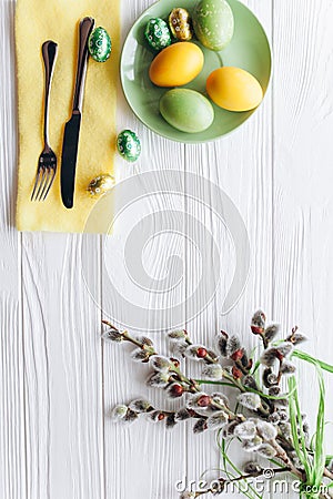 Easter concept. plate, fork, eggs on a white background Stock Photo