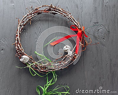 Easter concept wreath on a wooden background Stock Photo