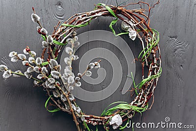 Easter concept wreath on a wooden background Stock Photo