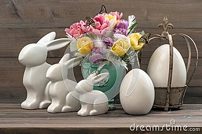 Easter deco with tulips, eggs and rabbits Stock Photo