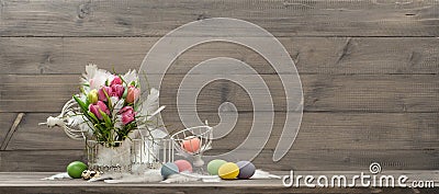 Easter decoration with pink tulip flowers and eggs Stock Photo