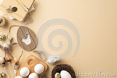 Top view photo of easter eggs in wooden holder quail nest ceramic rabbit sketchbook paintbrushes and feathers Stock Photo