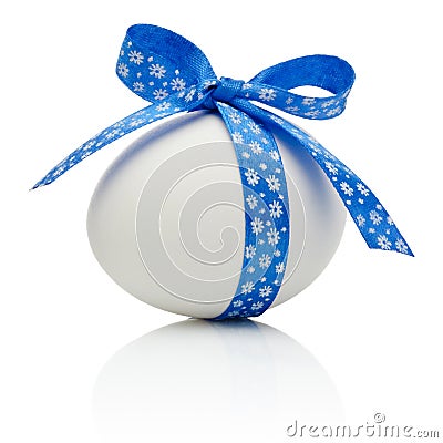 Easter egg with festive blue bow isolated Stock Photo
