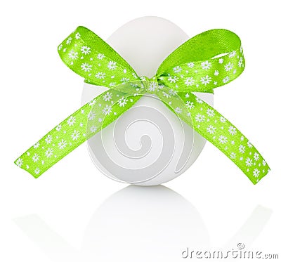 Easter egg with festive green bow isolated on white background Stock Photo