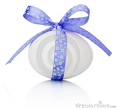 Easter egg with festive purple bow isolated on white background Stock Photo