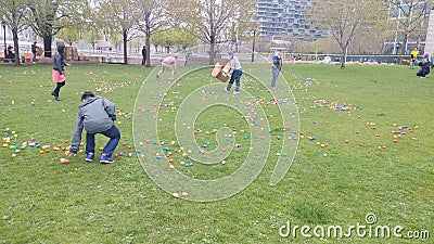 Easter egg hunt in Long Island City park Editorial Stock Photo