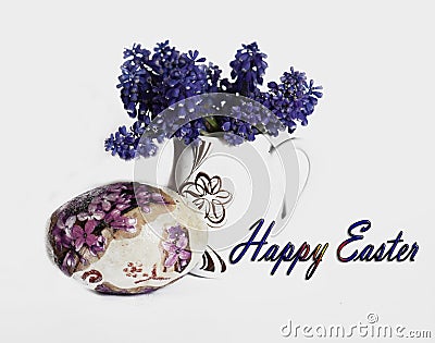 Easter egg and nice spring flower in a white vase Stock Photo