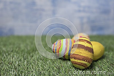Easter eggs colored on grass wide view or side view Stock Photo