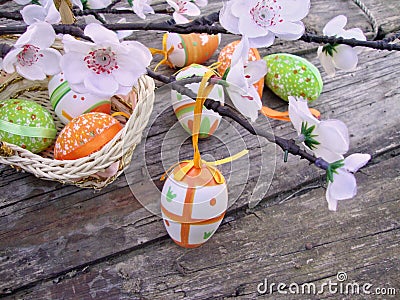 Easter eggs with flowers on wooden background Stock Photo