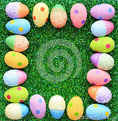 Easter Eggs on a glass like background No space on sides Stock Photo