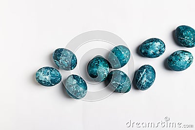 Easter eggs isolated painted by hand in blue color on white background Stock Photo