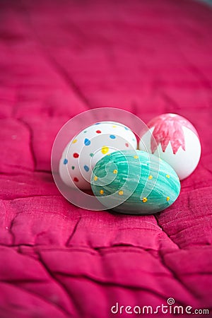Easter eggs lying on a red background Stock Photo
