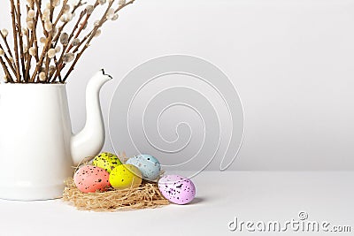 easter eggs nest pussy willow white background Stock Photo