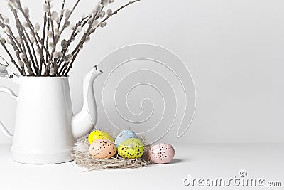 easter eggs nest pussy willow white background Stock Photo