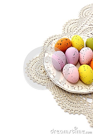 Easter eggs on old plate isolated on white Stock Photo