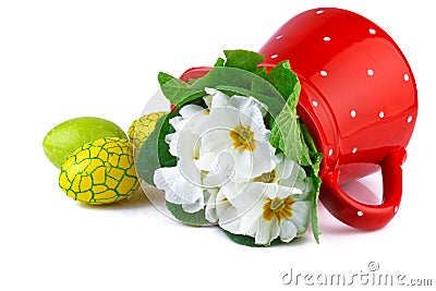 Easter eggs and red jug with white flowers Stock Photo