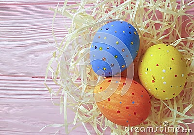 Easter eggs rustic straw,background vintage unique wooden pink space springtime festive april, card Stock Photo