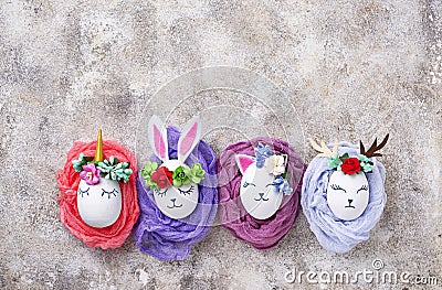 Easter eggs in shape of bunny, cat and deer Stock Photo