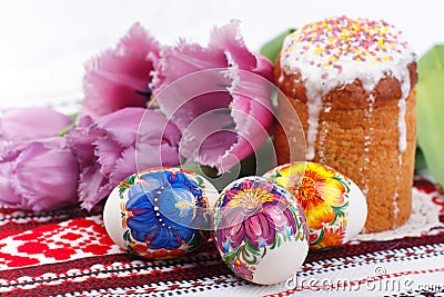 Easter eggs, tulups and cake Stock Photo