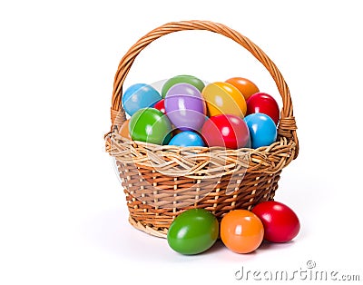 Easter eggs in wicker basket Stock Photo